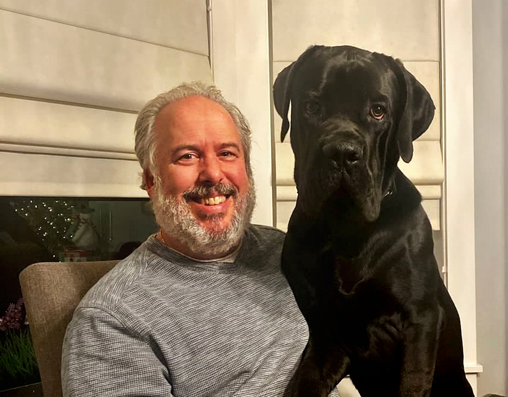 Meadow Outdoor Advertising Sales Managers Brad Parsons with his black dog